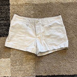 Mid-rise white/light cream jean shorts. They are a size 6.